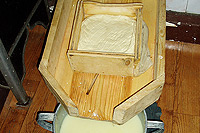Milk is used to produce a cheese called cas which may be smoked